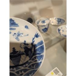Pair of Chinese blue and white tea bowls, one with cover and four saucers, depicting two figures on a boat at sea, tea bowl H7cm