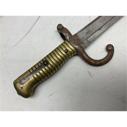 French model 1866 sabre bayonet, the 57.5cm curving blade marked St. Etienne 1873; in associated steel scabbard L71cm; and Mosin-Nagant M1891 socket bayonet with 43cm cruciform blade No.37068 (no scabbard) (2)