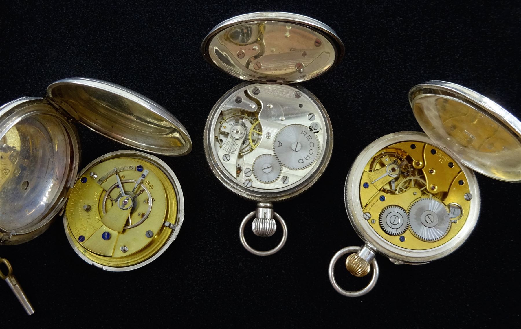 Two silver open face keyless lever pocket watches by Favre-Leuba & Co Zenith and Record James Walker, London and a full hunter lever fusee, the dial stamped Made in England for Stevenson Bros Adelaide, all with white enamel dials and subsidiary seconds dial, hallmarked (3)