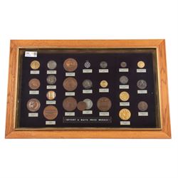 Bryant and May's Prize medals, in frame, H53cm, L84cm