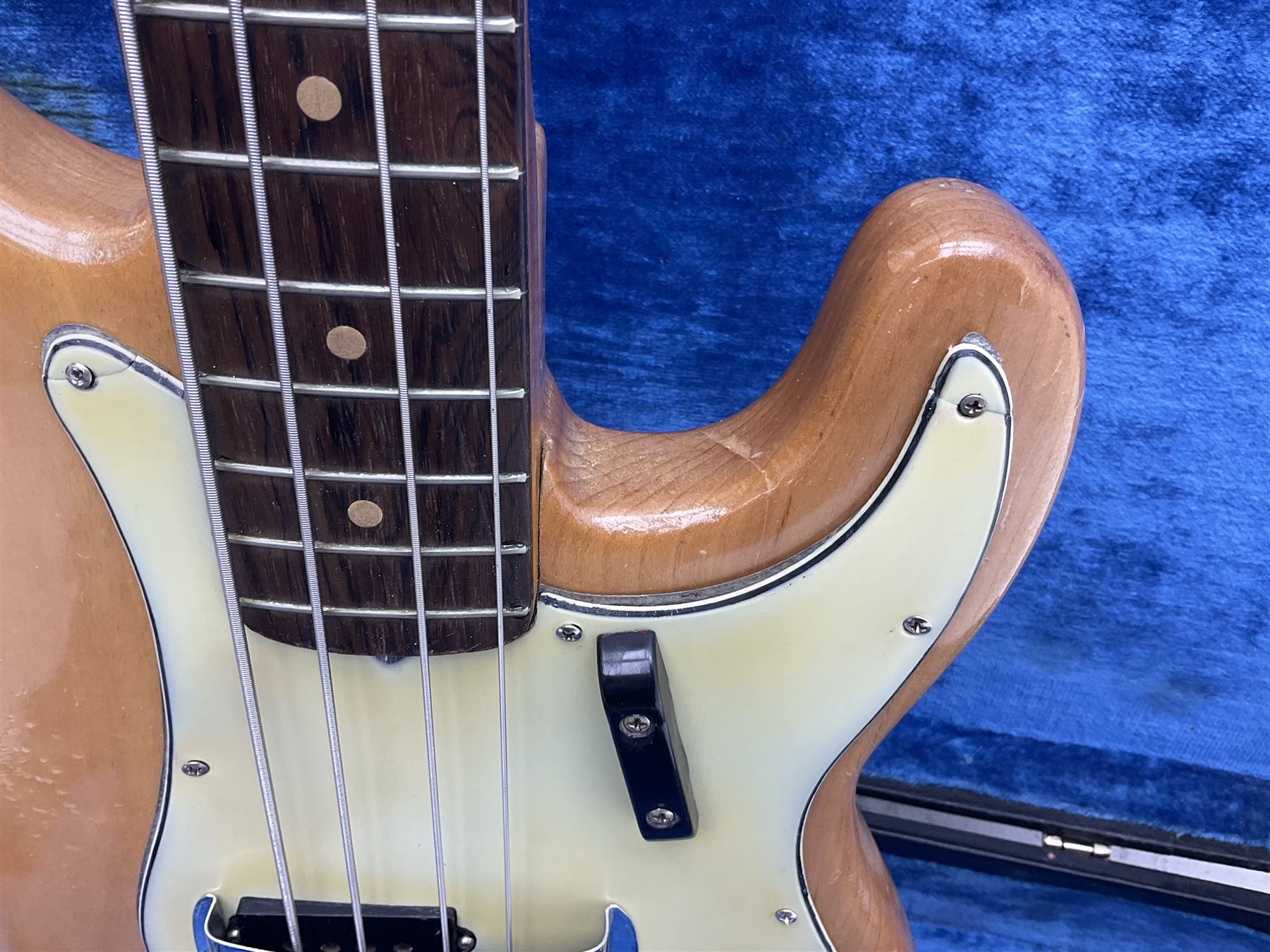 1962 Fender Precision bass guitar; re-finished in natural alder in the 1970s; impressed date code 5NOV62C to end of neck and serial no.90537 to back plate; L115.5cm; in replacement hard carrying case