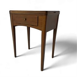 Mid-20th century teak sewing table, rectangular top with hinged fold-out extension revealing built-in Singer sewing machine, fitted with single hinged drawer, on square tapered supports; various Singer accessories to include Fashion Discs and Motor Controller
