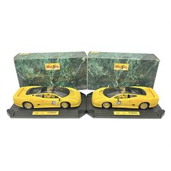 Two Maisto 1:12 scale Jaguar XJ220 'Racing' cars in yellow
