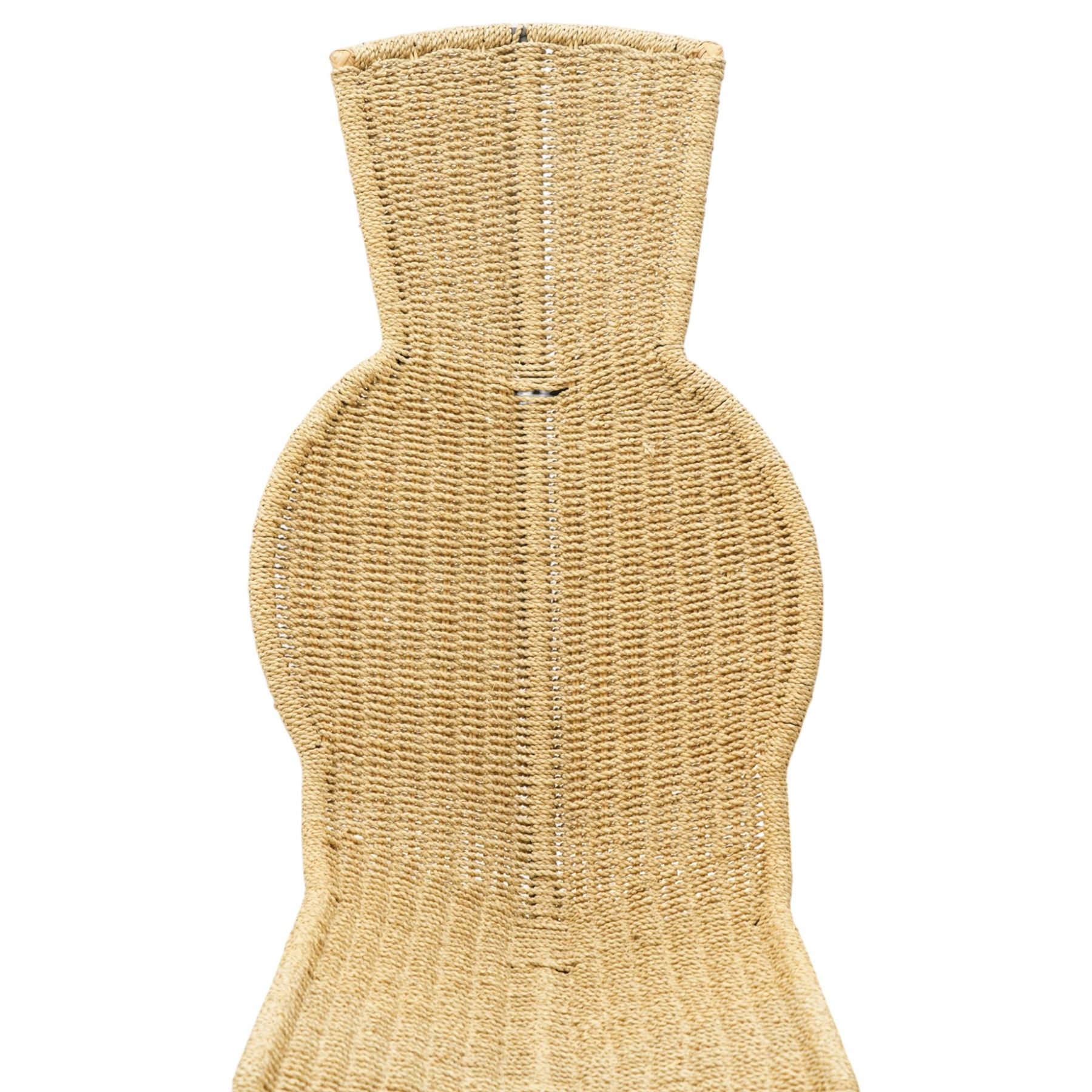 Tom Dixon (1959-) for Space Design - 1990s woven rattan lounge chair, exaggerated S-shaped profile with integrated seat, back and headrest, on concealed tubular metal framework and curved rattan-clad supports