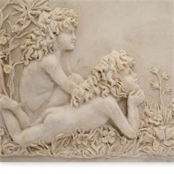 Composite plaque, depicting Sprites in a garden, with inset 'Arts and Commerce Promoted' medallion to reverse, 20cm x 33cm; together with a moulded glass Claret jug with silver plated mount H30cm 