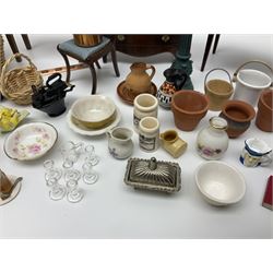 Collection of miniature dolls house furniture and accessories, to include long case clock, chest of drawers, tiled wash stand, ceramics and glass ware, mirror, baskets, etc 