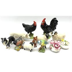 Eight Beswick animals comprising a seated Fox, Sheepdog, Ram, Sheep, Lamb, CH Wall Queen, Blue Tit and Bullfinch together with a pottery cockerel and hen and two porcelain flower ornaments