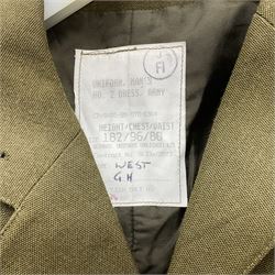 Two post-WWII British Army No.2 Dress tunics, one with Green Howards buttons; army shirt dated 1951; Royal Fleet Auxilliary jacket with trousers; three RAF/WAAF uniforms and RAF Greatcoat; and three canvas/webbing bags, two dated 1943 & 1945