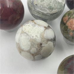 Six mineral specimens spheres, comprising jasper red, spotted agate, unakite, sardonyx, petrified wood and bloodstone, D2cm