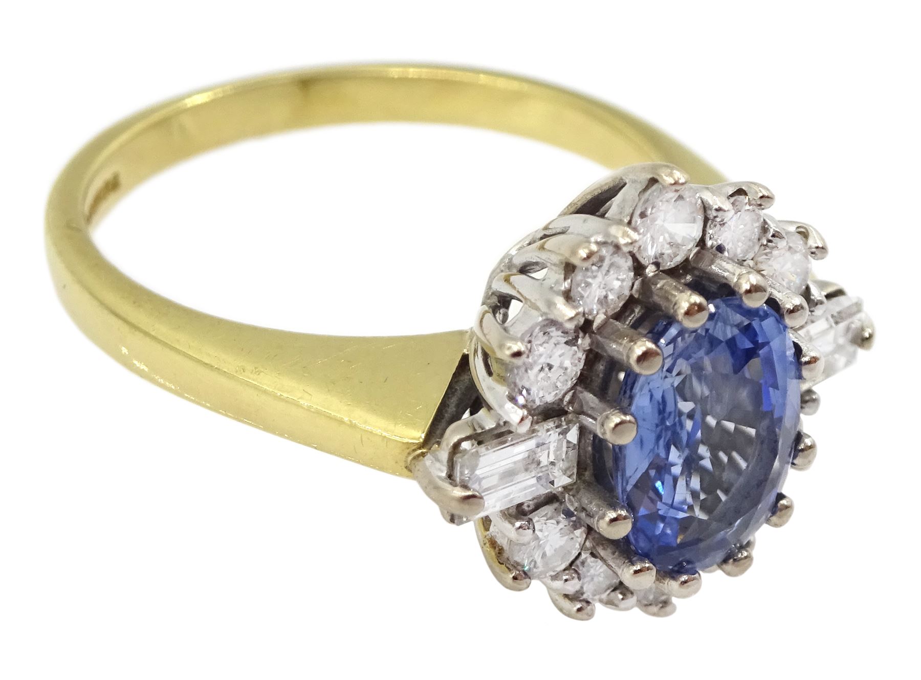 18ct gold oval sapphire, baguette and round brilliant cut diamond cluster ring, Birmingham 1991, sapphire approx 1.35, total diamond weight approx 0.50 carat
