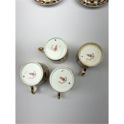 Four Royal Crown Derby coffee cans, together with six saucers, all decorated in the Imari 2451pattern, coffee can H5cm, saucer D10.5cm. (10).