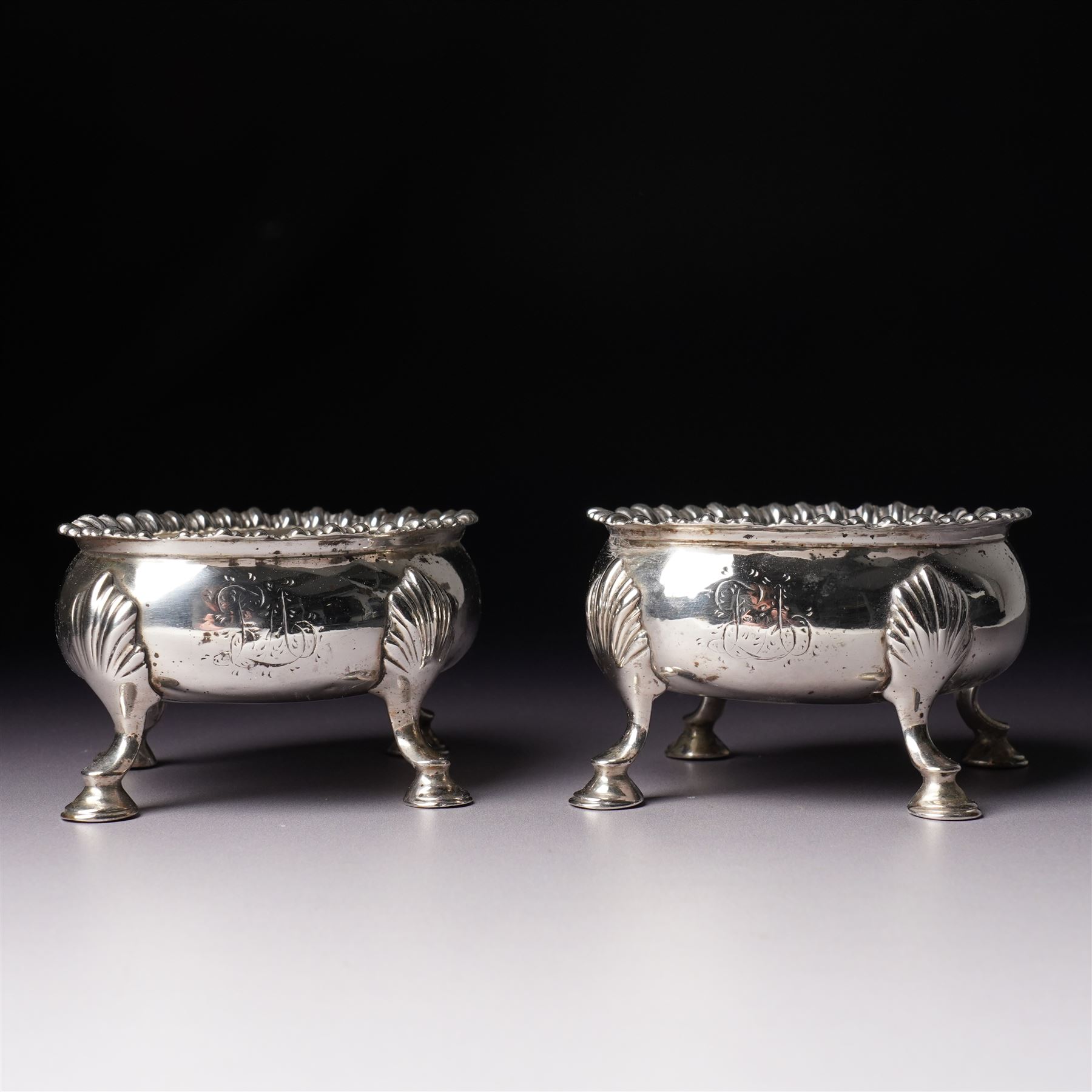 Pair of early George III silver oval salts with moulded rims and on four shell moulded supports W8.5cm London 1867 Maker D & R Hennell