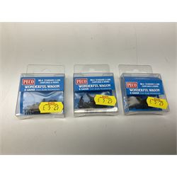 Bachmann '00' gauge - Scenecraft single track engine shed and provender Store; unboxed; and ten unopened Peco accessory packs including buffer stops, couplings etc