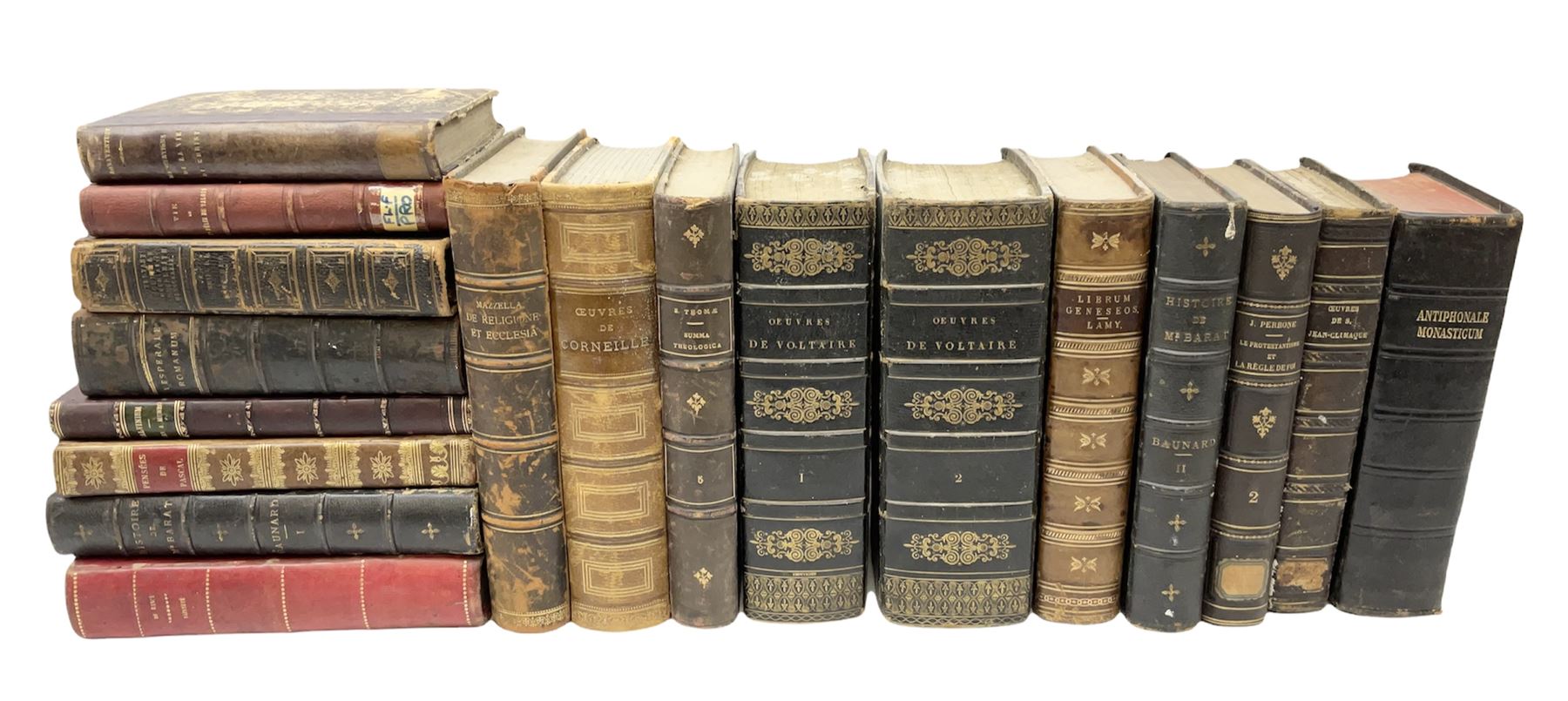 Eighteen 19th century leather bound books including Oeuvres Completes De Voltaire. 1827 Paris. Two volumes; Oeuvres De Pierre Corneille. 1892 Paris; Commentarium in Librum Geneseos Scripsit Thomas Josephus Lamy. 1883 Mechliniae; etc (18)
