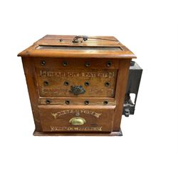 'Hearson's Patent Champion Incubator' mahogany paraffin egg incubator, decorated with 'Proprietors
Spratt's Patent Ld' in gilt scrolls, with central plaque and brass handle, H52cm W54cm excl side fitting