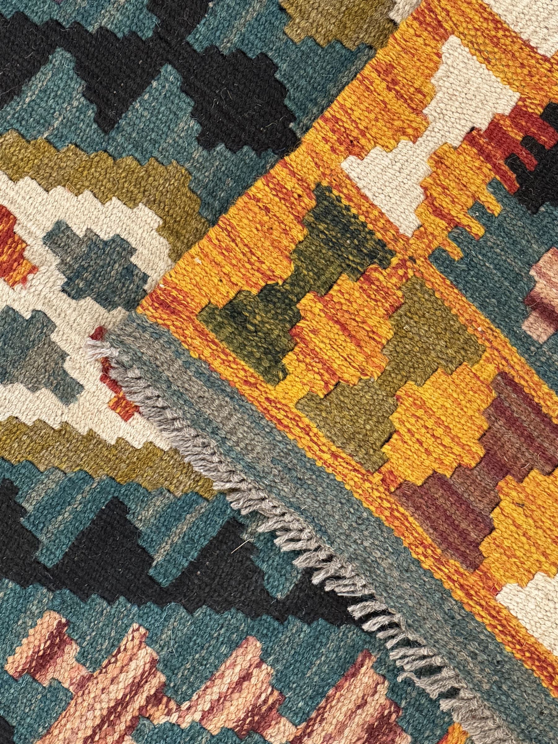 Afghan Maimana Kilim flatweave runner, handwoven with a teal ground featuring a bold multicoloured diamond-lattice design, enclosed by stylised border motifs, finished with fringed edge