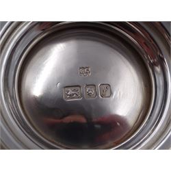 Mid 20th century three piece silver coffee service, comprising coffee pot, milk jug and twin handled open sucrier, of waisted form upon circular domed foot,  with oblique gadrooned rim, the milk jug and sucrier with acanthus capped handles, the coffee pot with wooden handle and finial, hallmarked William Comyns & Sons Ltd , London 1961, coffee pot H27.5cm