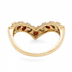 9ct gold garnet and opal wishbone ring, set with alternate round cut garnets and cabochon cut opals, London 1980