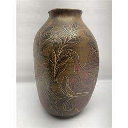 John Egerton (c1945-): studio pottery stoneware vase decorated with red birds in foliage, upon a brown ground, H34cm
