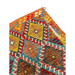 Chobi Kilim rug, multi-coloured ground in oranges, blues and greens, overall geometric design 