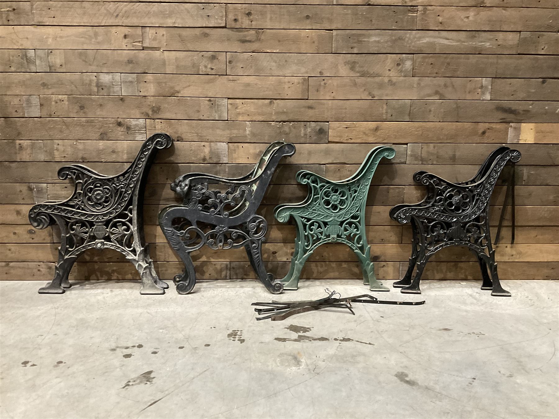 Four pairs of ornate cast iron bench ends (8)
