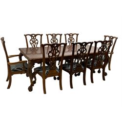 Chippendale Revival - hardwood extending dining table, rectangular gadroon carved top, on acanthus carved cabriole supports with ball and claw feet, with two additional leaves; together with a set of eight (6+2) dining chairs, shaped cresting rail over pierced and carved splat, upholstered drop-in seat, on acanthus carved cabriole supports with ball and claw feet