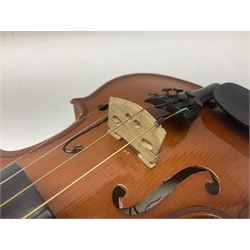 Four Chinese graduated violins - full size with 35.5cm two-piece back; three-quarter size with 33.5cm two-piece back; half size with 31cm two-piece back; and quarter size with 27.5cm two-piece back; all cased except full size; one with bow (4)