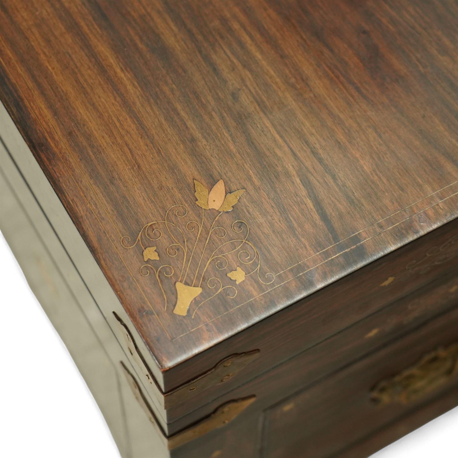 Pair of late 19th century colonial hardwood and brass inlaid chests, each rectangular with hinged top and brass strapping, floral and urn pattern inlay to the panels, with pierced brass side handles, fitted baize-lined butlers tray