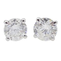 Pair of 18ct white gold round brilliant cut diamond stud earrings, total diamond weight 1.02 carat, with World Gemological Institute Report