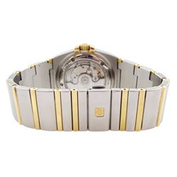 Omega Constellation gentleman's 18ct gold and stainless steel automatic Co-Axial chronometer wristwatch, champagne dial with date aperture, Cal. 2500, serial No. 80653768, on integral gold and stainless steel bracelet