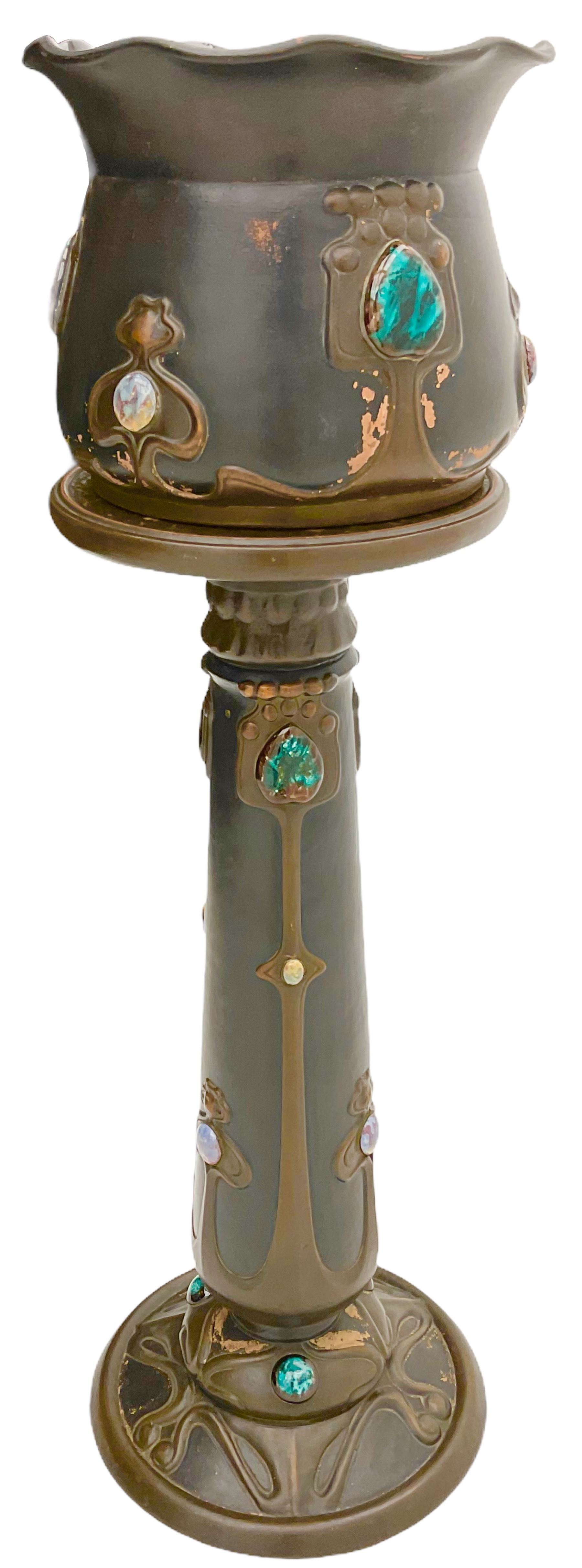 Early 20th century Bretby Art Nouveau Jardinière and stand, with applied cabochon detail, each with impressed mark beneath, jardinière H22.5cm D28cm, overall including stand H94.5cm