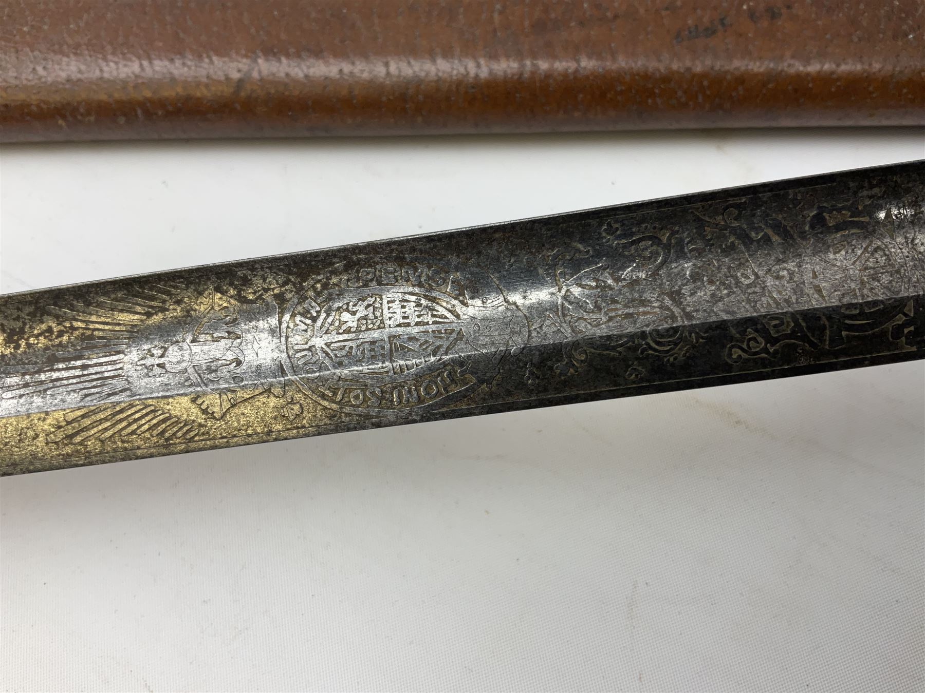 Victorian artillery officer's sword, the 90cm fullered steel blade by E. Thurkle Denmark Street Soho London decorated with Victoria cypher, Regimental crest and 'Royal Artillery', three-bar hilt with stepped pommel and wire-bound fish skin grip; in leather covered scabbard L107cm overall
