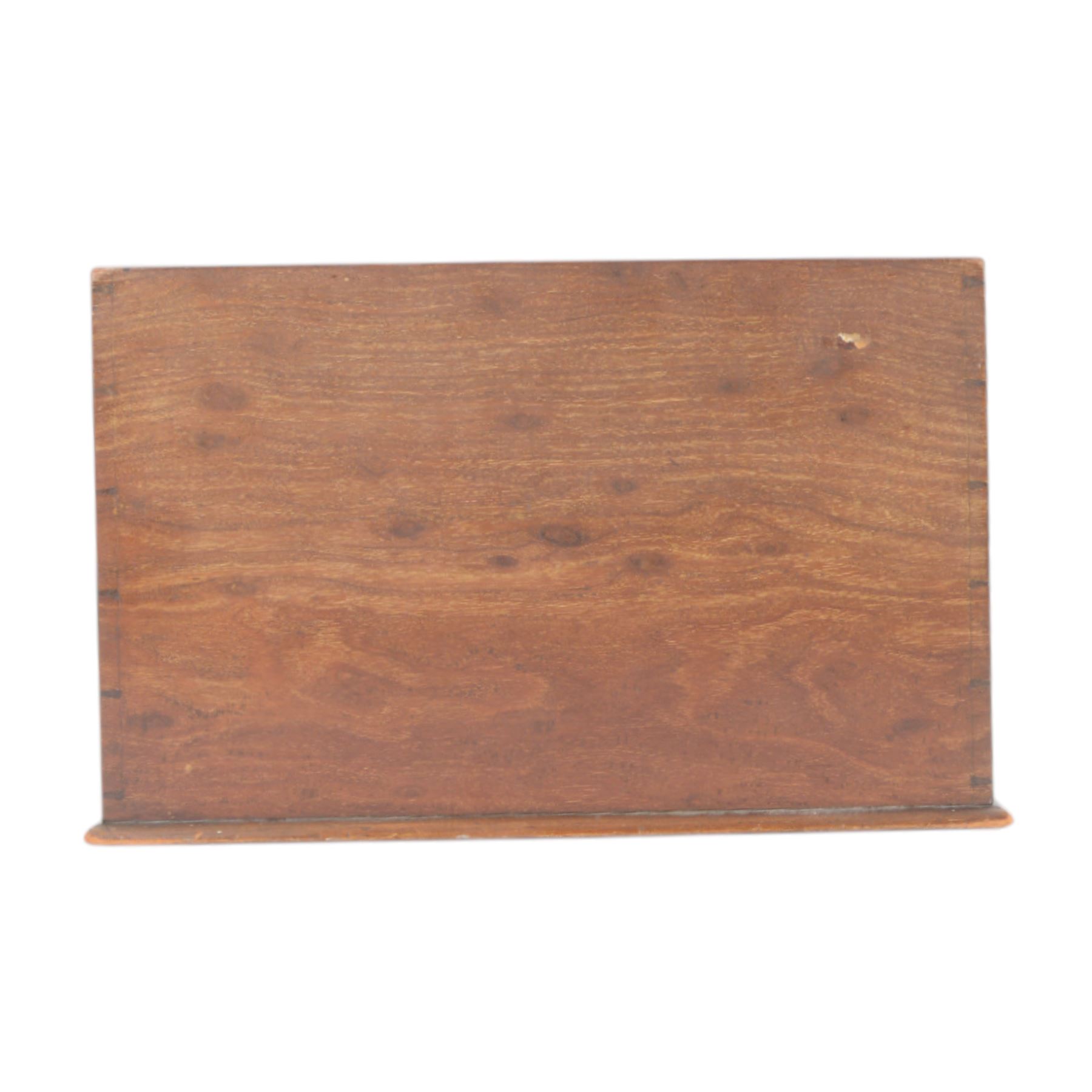 Edwardian mahogany letter rack, of rectangular form with curved sides and divided interior, the front inlaid with central oval fan motif and conforming corners, H20.5cm W33cm D14cm