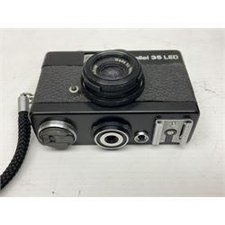 Three Rollei cameras, to include a Rollei 35 LED camera, with Triotar 3.5/40 lens and two Rollei XF 35 cameras, each with Sonnar 2.3/40 lenses