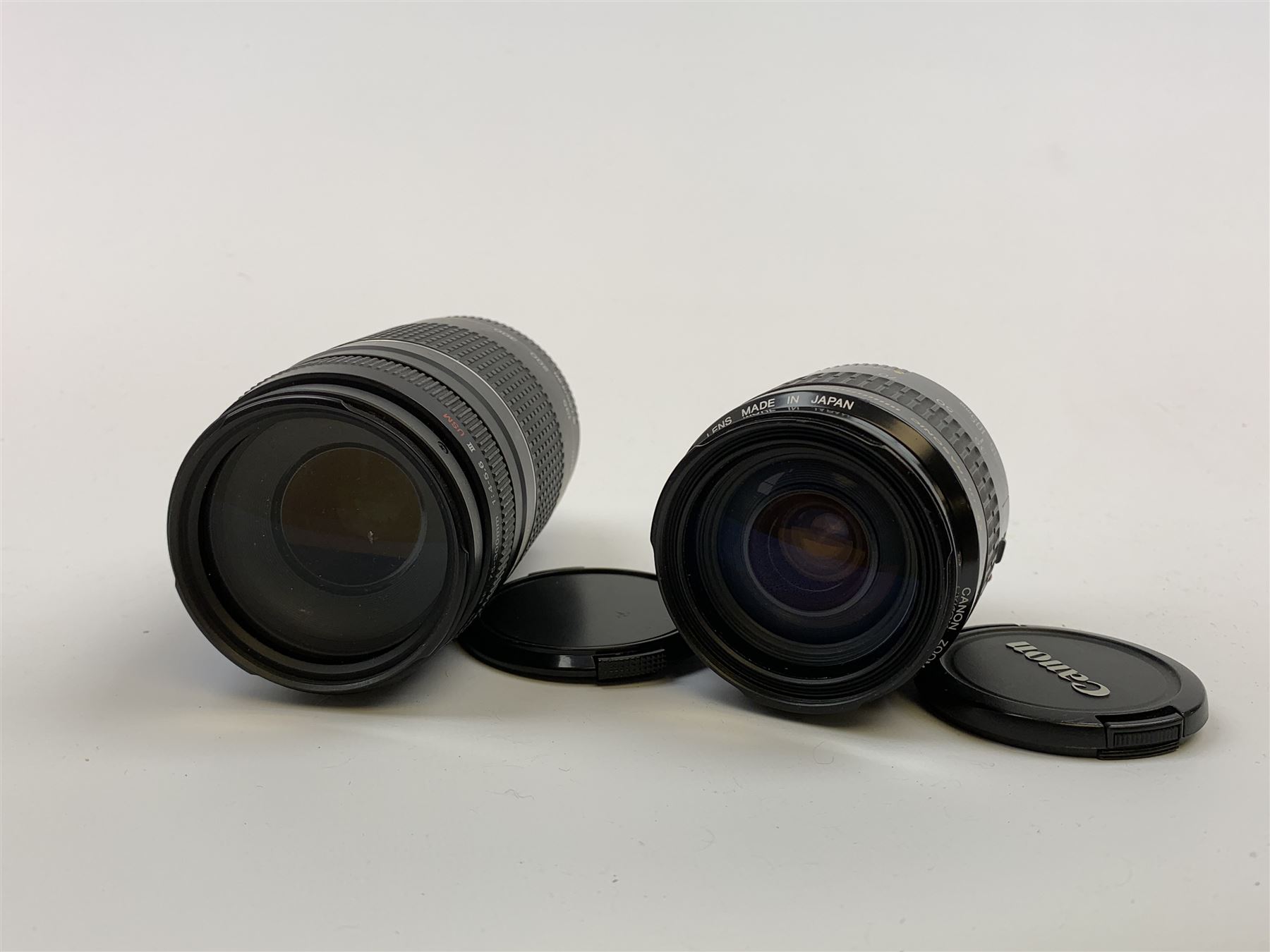 Canon EOS 350D digital camera with 'Canon Zoom Lens EF-S 18-55mm 1:3.5-5.6 II USM', with instruction manual and charger and two further lenses, Canon Ultrasonic 'Canon Zoom Lens EF 35-105mm 1:4.5-5.6' and a Canon Ultrasonic 'Canon Zoom Lens EF 75-300mm 1:4-5.6 III USM'