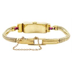 9ct gold calibre cut ruby and single cut diamond manual wind watch, case makers mark DS & S (possibly David Sutton & Sons), London 1946 on 9ct gold strap, in fitted velvet and silk lined case by Reids of Newcastle