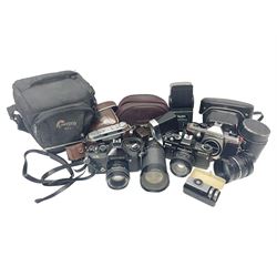 Collection of cameras and equipment, including Chinon CE camera body, with 'Auto 1:1.7 f=55mm' lens, Praktice MTL5 camera body, Praktic BMS camera body, with 'Pentacon Prakticar 1:1.8 f=50mm MC' lens etc 
