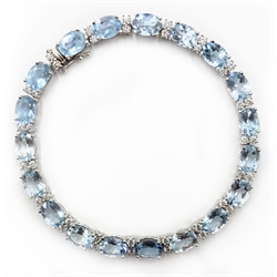  18ct gold oval aquamarine and diamond bracelet stamped 750  