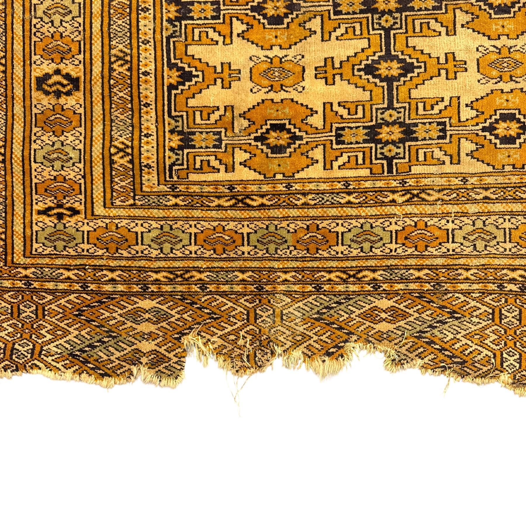 Bokhara rug, earthy ground, with repeating gul motifs, Persian pictorial rug on ivory ground with a densely patterned tree-of-life motif and symmetrically arranged deer, birds, and  other wildlife, 182x149cm & 152x90cm, (2)