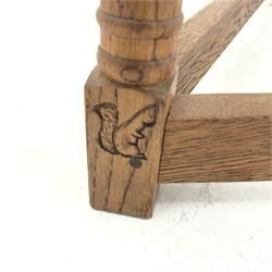 Mid to late 20th century circular oak occasional table, three baluster supports joined by floor stretchers with squirrel engraving, D55cm, H52cm