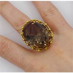 14ct gold single stone large oval smokey quartz ring, stamped