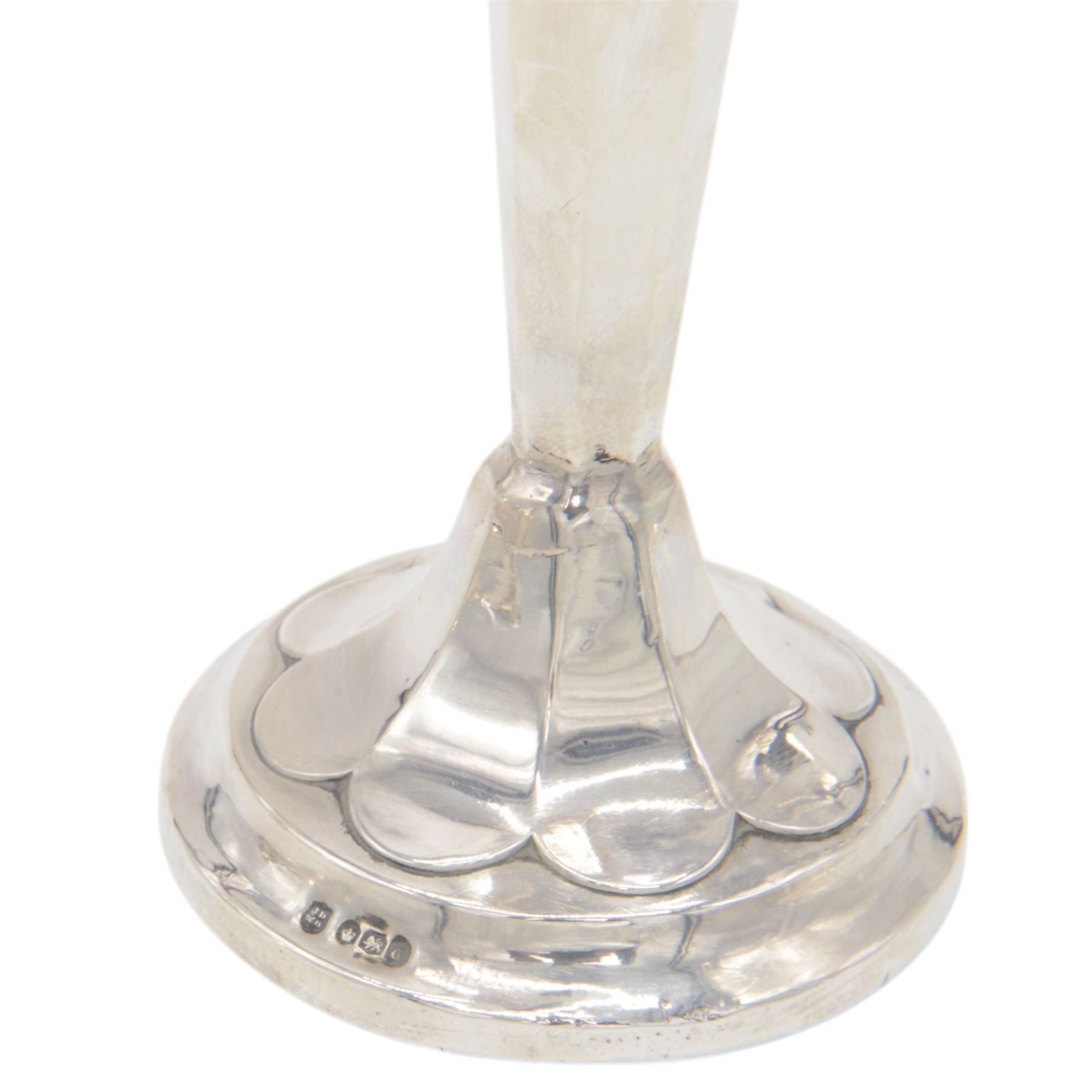 Two 1920s silver mounted trumpet vases, the first example of faceted form, hallmarked James Deakin & Sons, Sheffield 1921, the second example with fluted rim, hallmarked Walker & Hall, Birmingham 1922, tallest H25cm