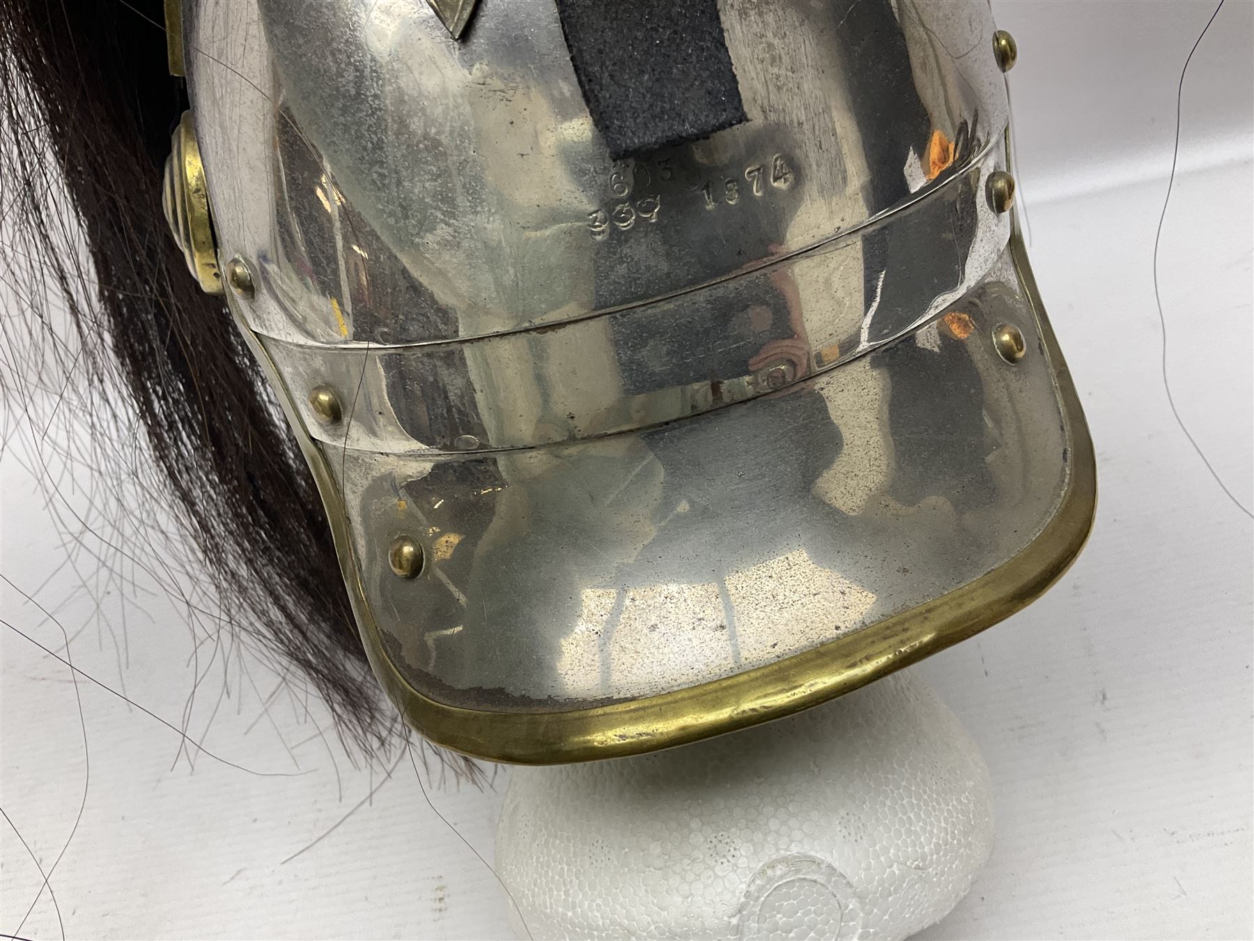 French 1874 Pattern Dragoon trooper's helmet with original liner and extra long criniere; stamped 10 DR with other numbers and Alexis Godilllo to the back of the helmet
