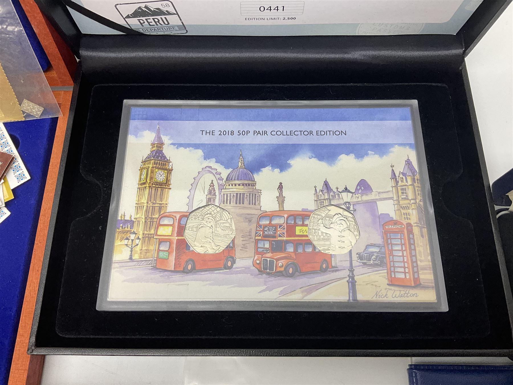 Mostly commemorative and fantasy coinage including commemorative crowns, 2018 'The Capsule Edition featuring the 2018 Paddington 50p coins' in display case, The Royal Mint Solomon Islands 2007 one ounce fine silver five dollars coin on card etc