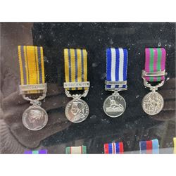 Limited edition large framed display board with sixty half-size copies of British Gallantry and Campaign Medals produced by Danbury Mint; all with ribbons and associated booklet