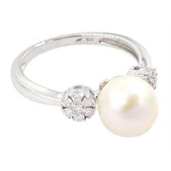 9ct white gold pearl and diamond ring, the central white cultured pearl, with two clusters of round brilliant cut diamonds either side, stamped 375