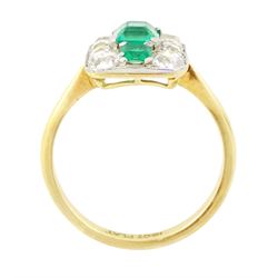 Early 20th century gold emerald and diamond panel ring, three octagonal cut emeralds, with four old cut diamonds set either side, stamped 18ct Plat, total diamond weight approx 0.85 carat