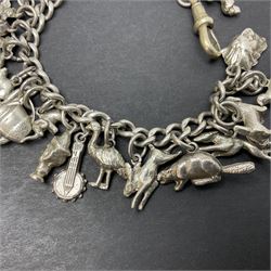 Silver charm bracelet, with twenty-five mostly animal charms including lion, greyhound, cat, horse, elephant and fish etc