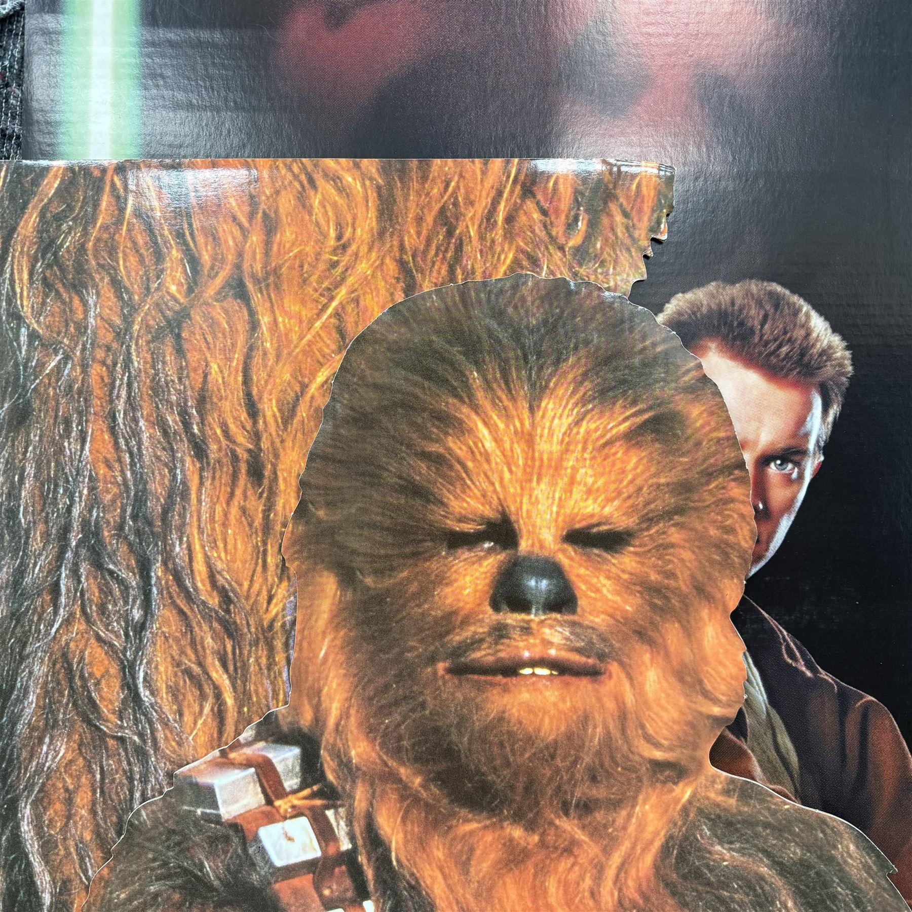 Star Wars Chewbacca cardboard cut-out, together with a Star Wars Phantom Menace Playstation advertising cardboard cut out, tallest H150cm
