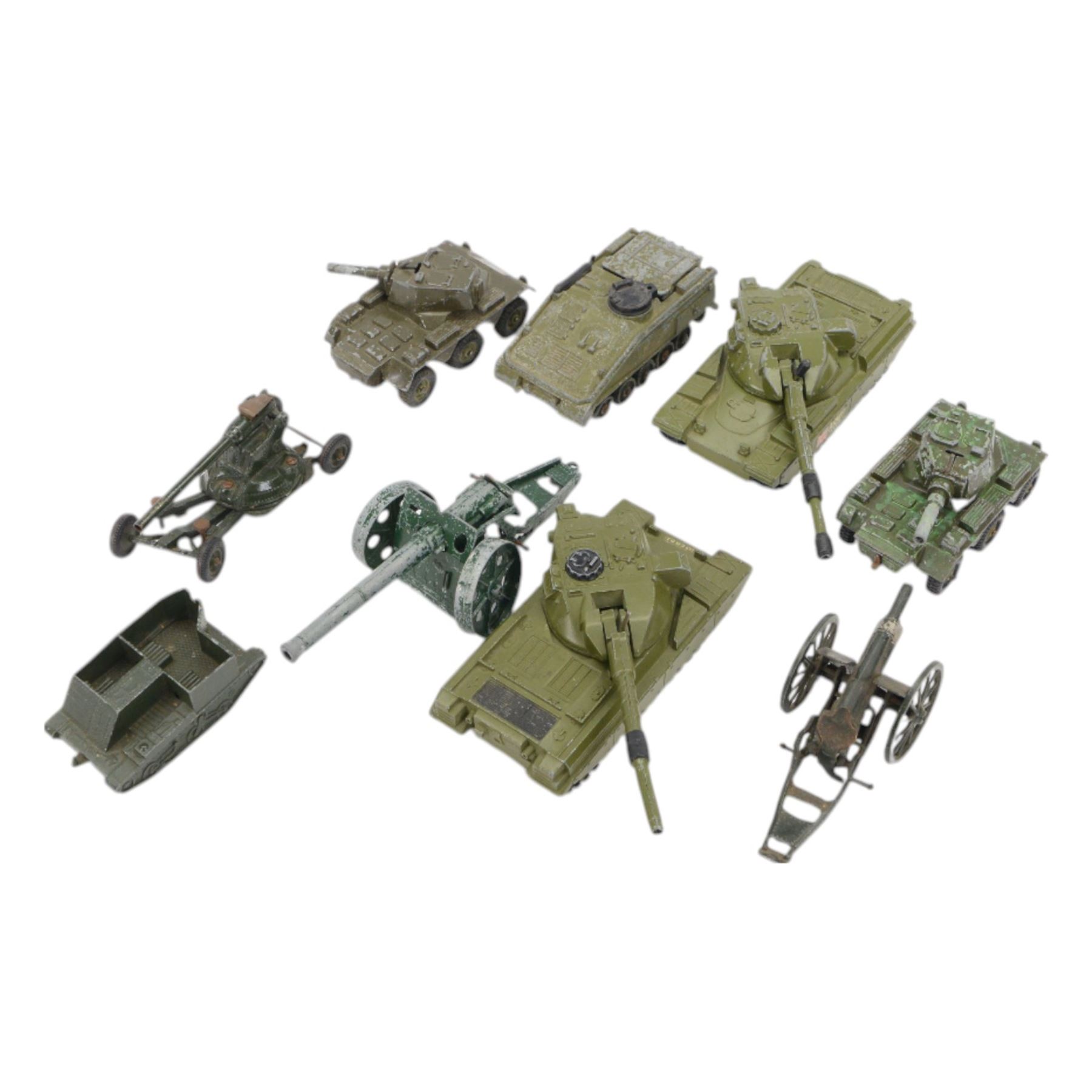 Nine military diecast figures, including two Dinky Toys Chieftain Tank, Dinky Toys Alvis Striker and three Britains field guns